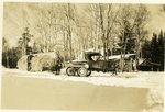 Logging Camp Men with a Truck Equipped for Winter in Maine