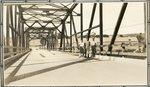 Presque Isle, Maine, Men Standing on a Bridge