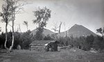 Cabin, Field, Trees, Mountain (Untitled) by Bert Call
