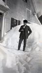 Maine Winter Scene, Man in a Suit and Fur Hat by Bert Call