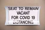 COVID-19 Images_Marketing & Communications_Social Distancing Seat Sign by University of Maine Division of Marketing & Communications
