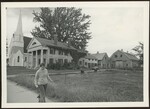 View of Church ,House and Walking Women in "New Hampshire" by Franco-American Programs, Orono, ME