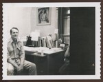 Men Sitting at Desk by Franco-American Programs, Orono, ME