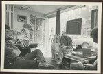 3 Men Sit in Store Front Room by Franco-American Programs, Orono, ME