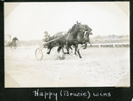 Happy (Brusie) wins by Guy Kendall