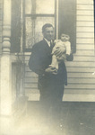 John Dearborn holding Henry D.L. Owen