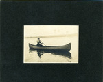 Helen Dearborn Paddling a Canoe