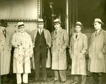 Jack Dempsey with Group in Front of a Train
