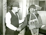 Doc Almy Shaking the Hand of Charley Miller
