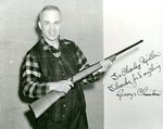 Charley Miller Holding a Rifle