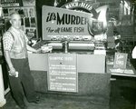 Charley Miller at Fishing Lure Display by Peterson Photo