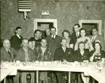 Charley Miller with a Group at a Banquet