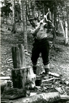 Eddie Collins of the Boston Red Sox Chopping Wood in Maine