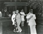 Dancing at an Alumni Reunion. by Keith Dresser